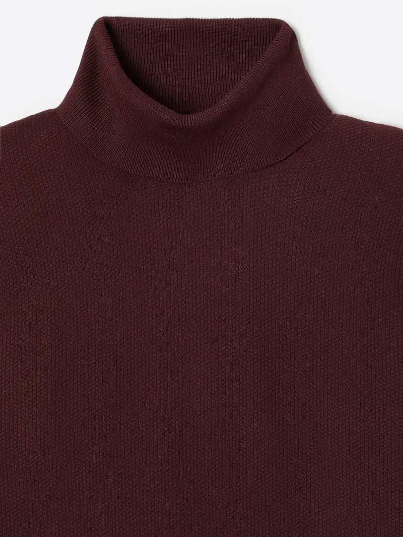 Pull col roulé en jacquard