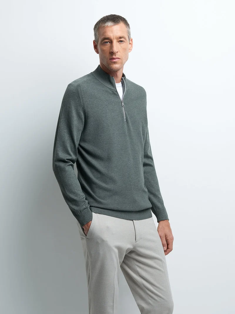 Pull col cheminée zippé