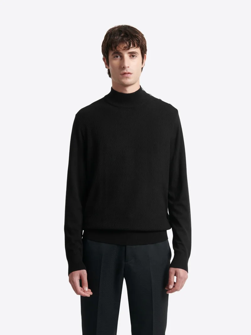 Pull col cheminée épaule boutonnée