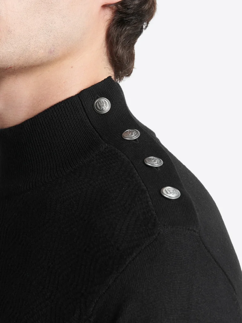 Pull col cheminée épaule boutonnée