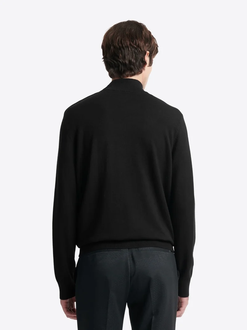 Pull col cheminée épaule boutonnée