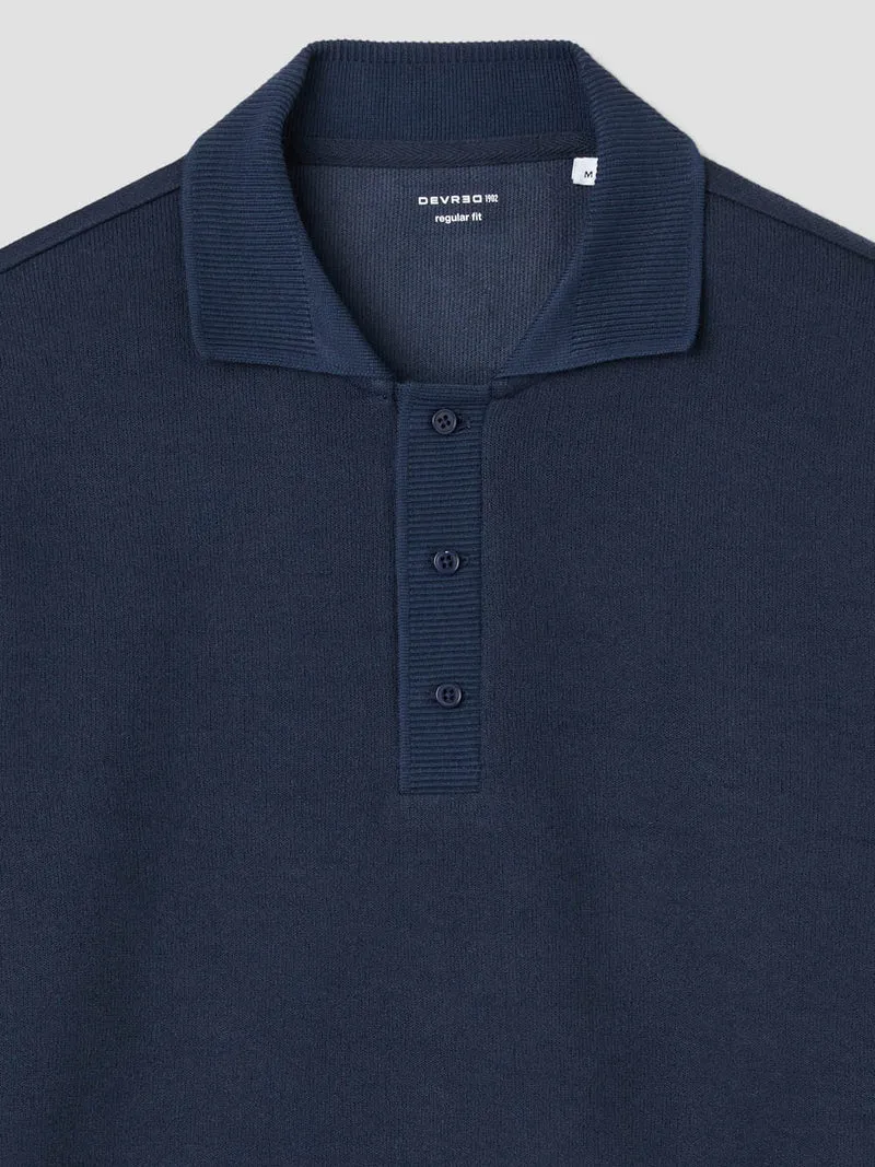 Polo manches longues col boutonné