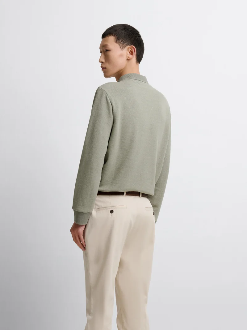 Polo manches longues col boutonné