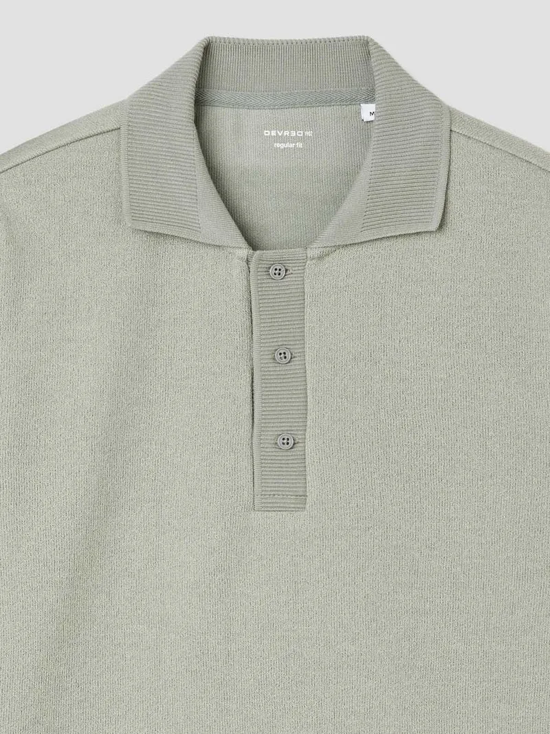 Polo manches longues col boutonné