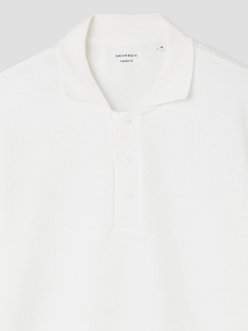 Polo manches longues col boutonné