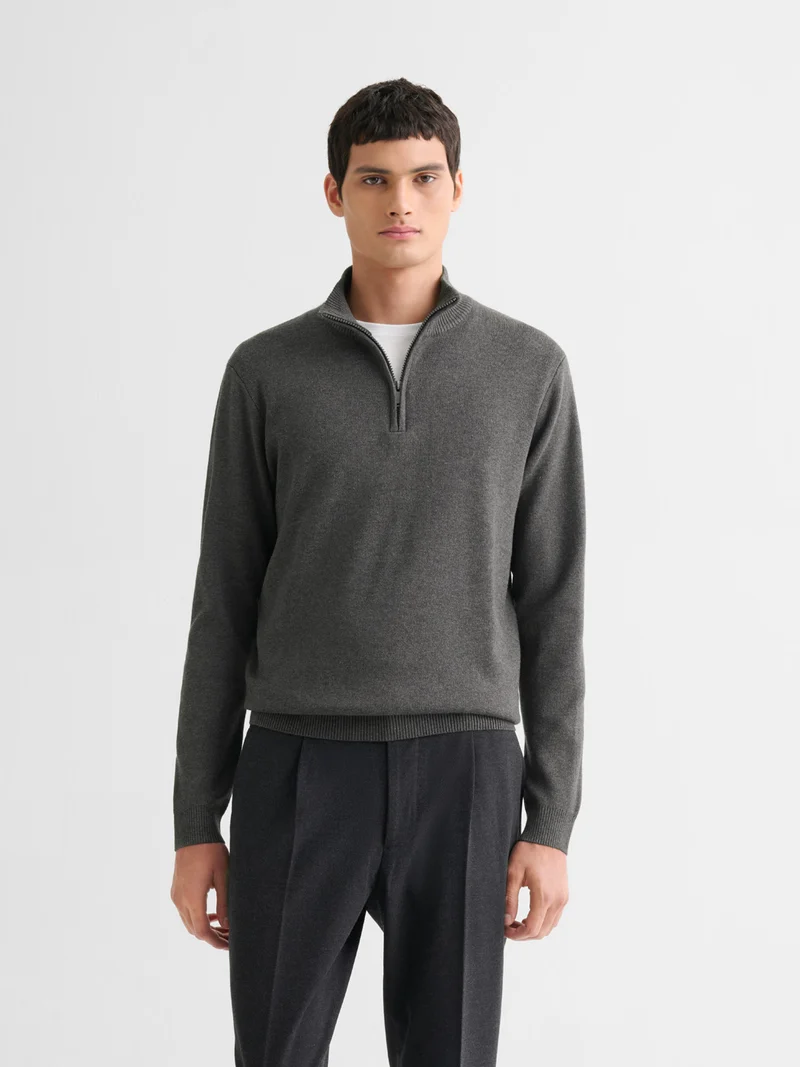 Pull col cheminée zippé
