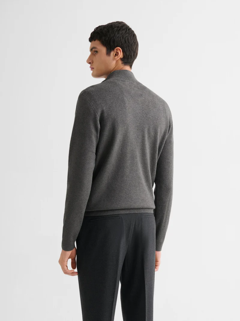 Pull col cheminée zippé