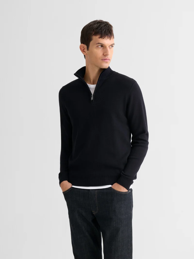 Pull col cheminée zippé