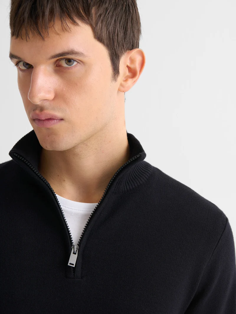 Pull col cheminée zippé