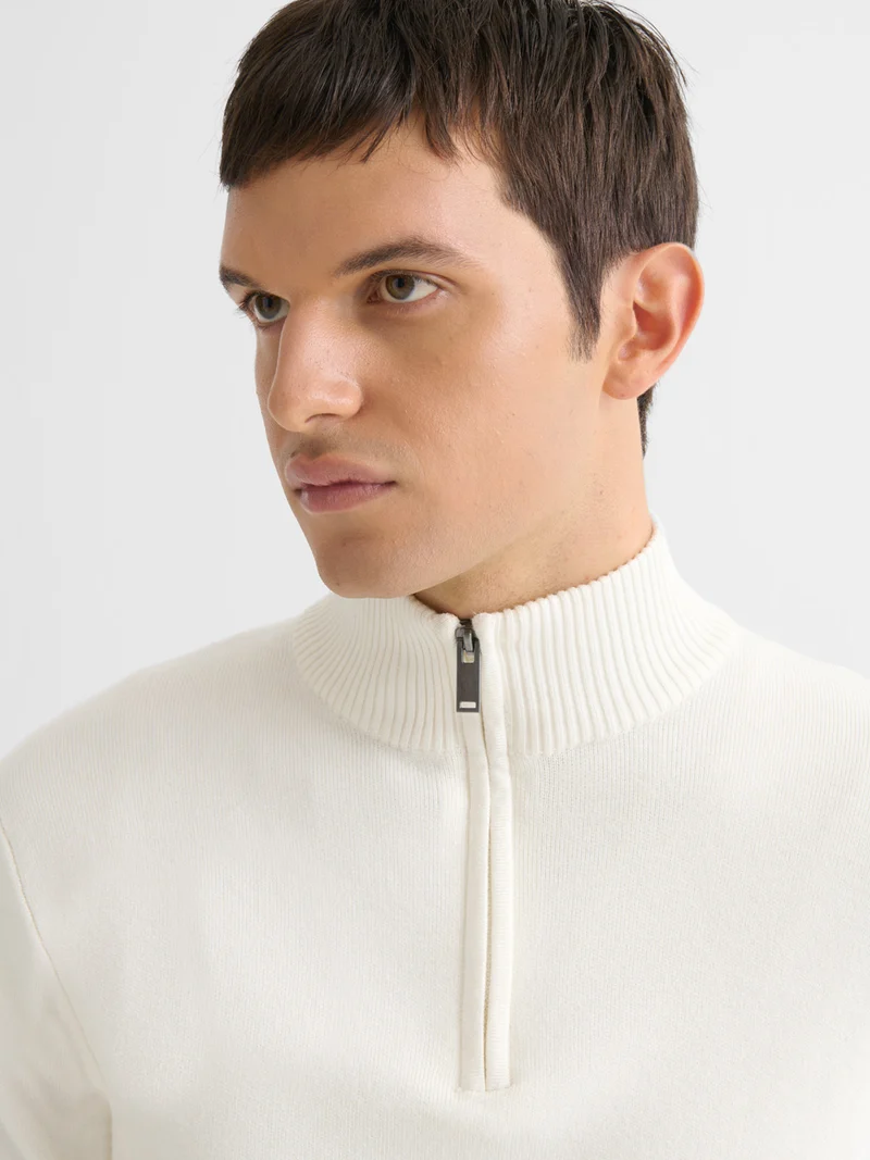 Pull col cheminée zippé