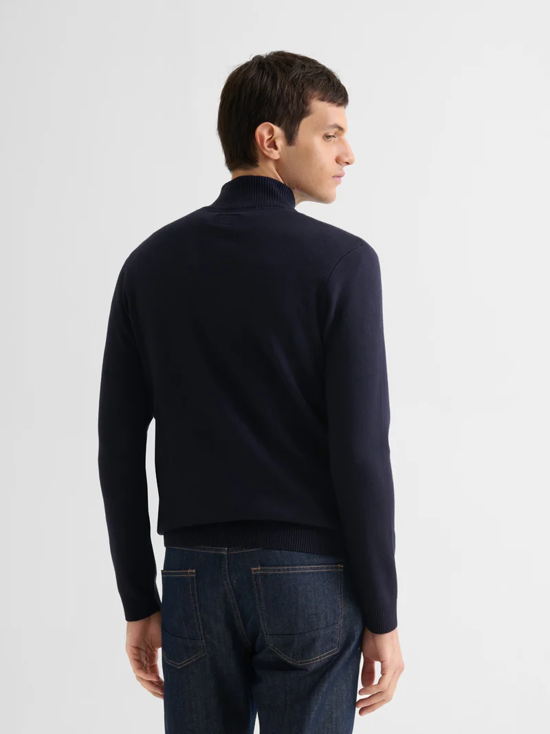 Pull col cheminée zippé