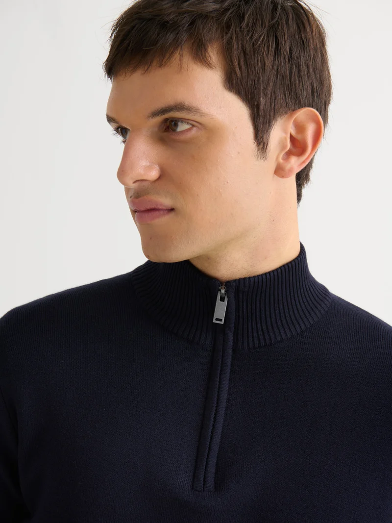 Pull col cheminée zippé