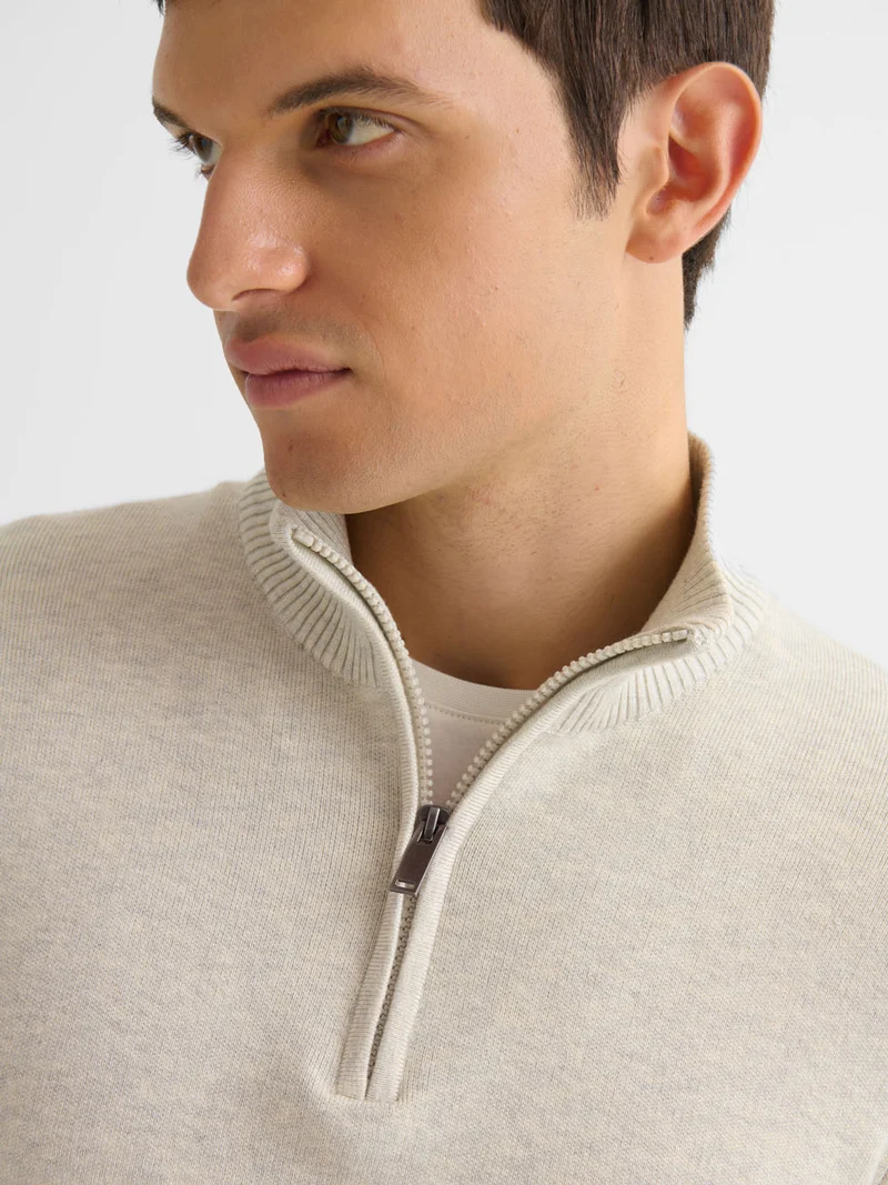 Pull col cheminée zippé