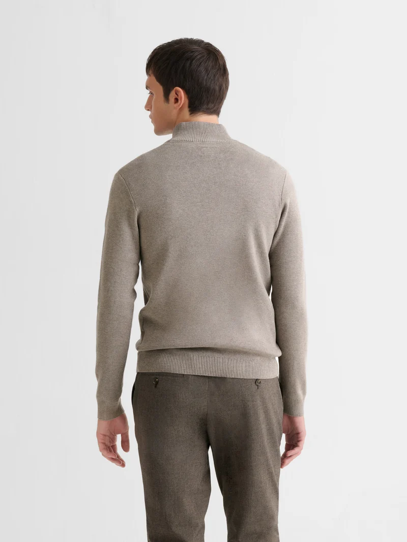 Pull col cheminée zippé