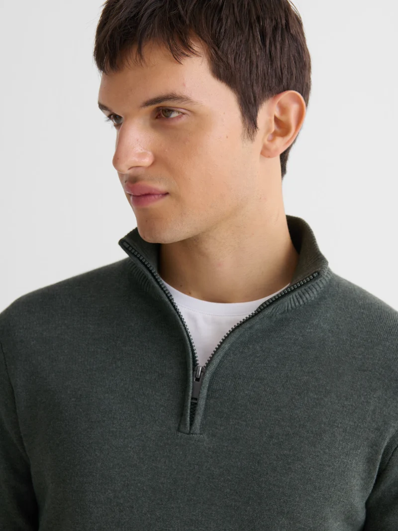 Pull col cheminée zippé