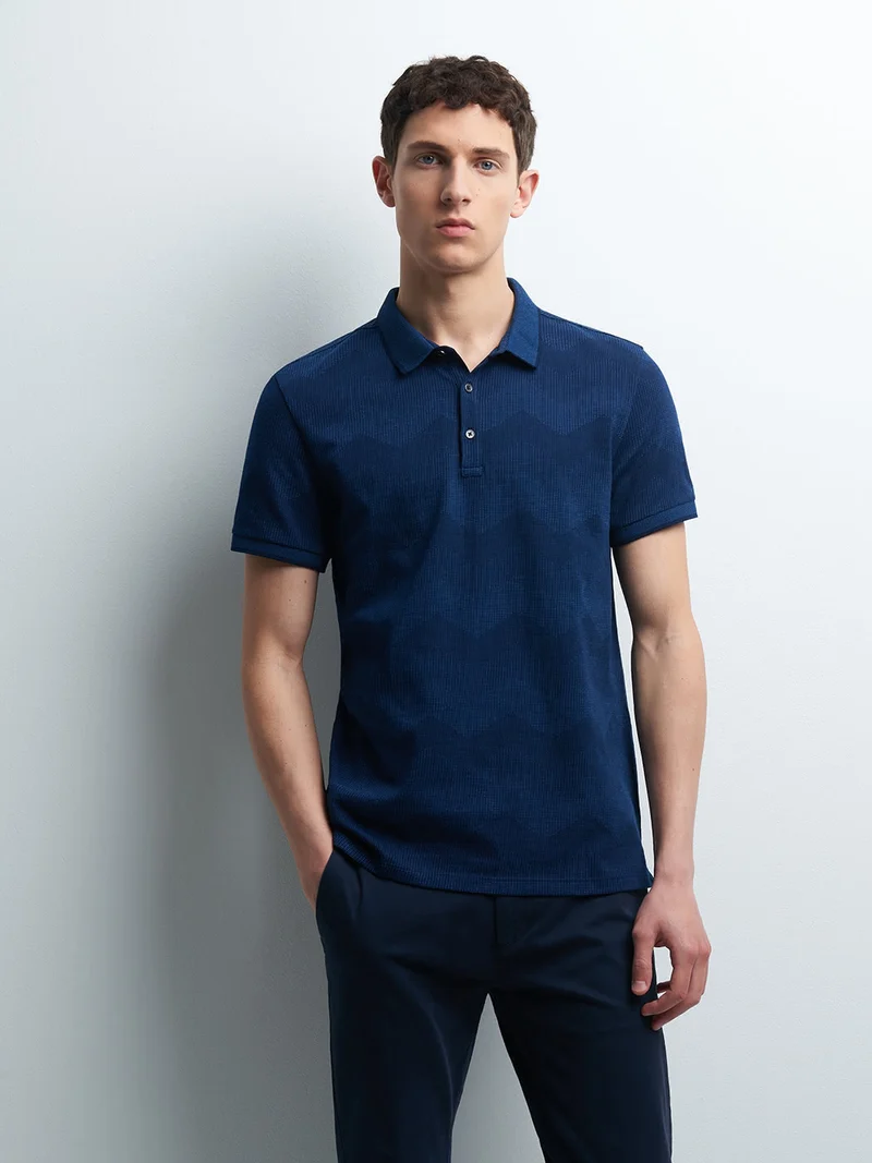 Polo à manches courtes motif géométrique