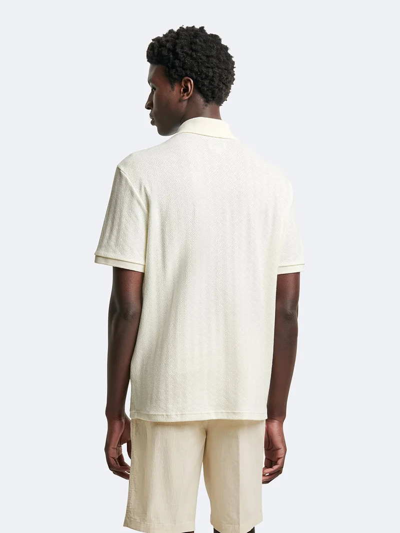 Polo manches courtes en coton à motif