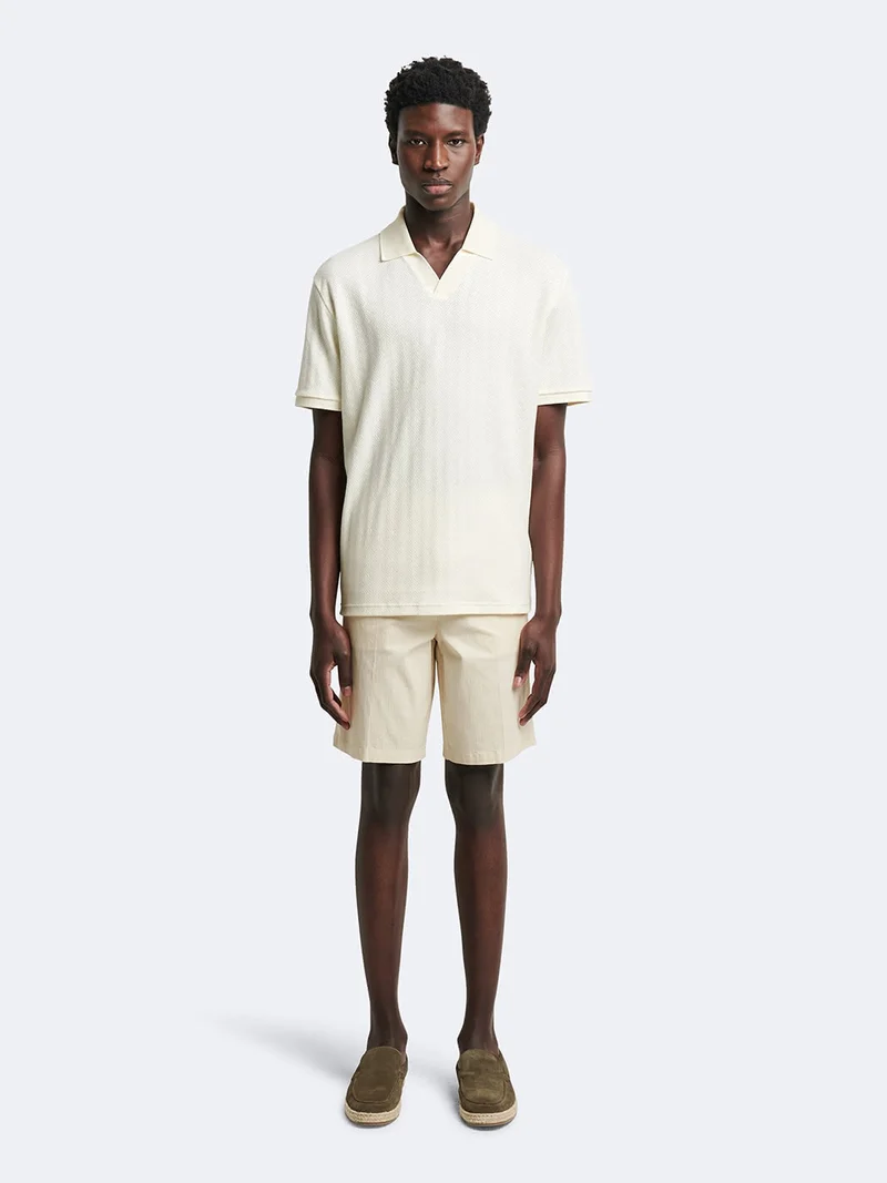 Polo manches courtes en coton à motif