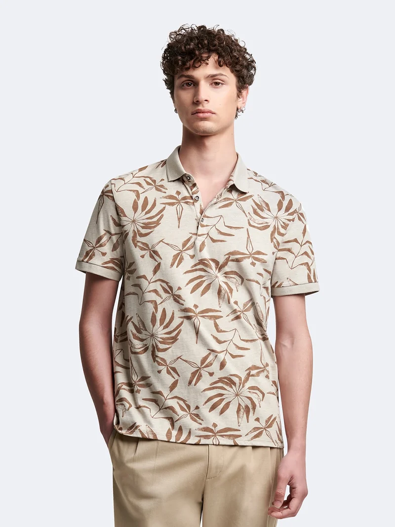Polo manches courtes en coton fleuri