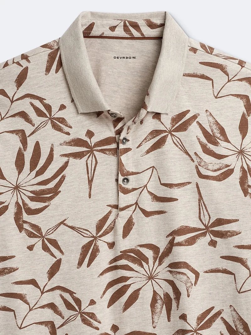 Polo manches courtes en coton fleuri