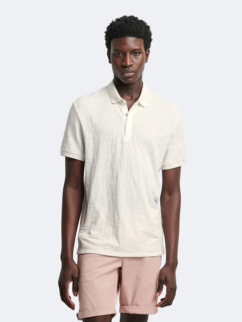 Polo manches courtes en coton à motif