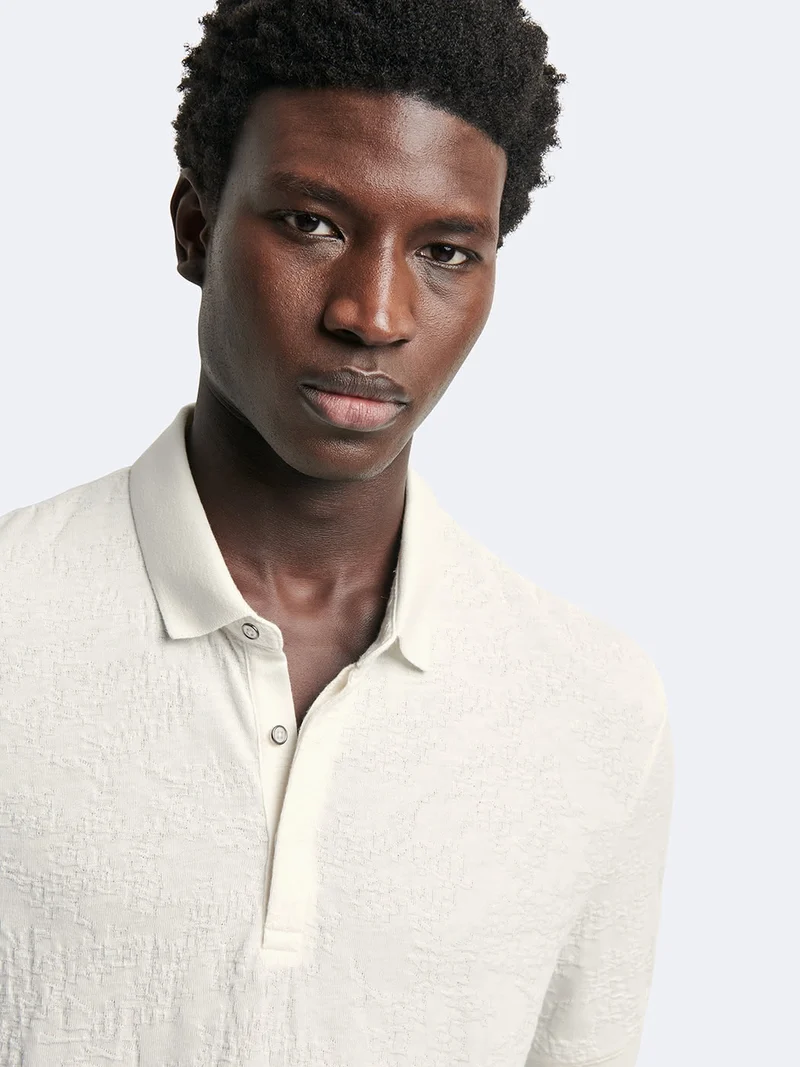 Polo manches courtes en coton à motif