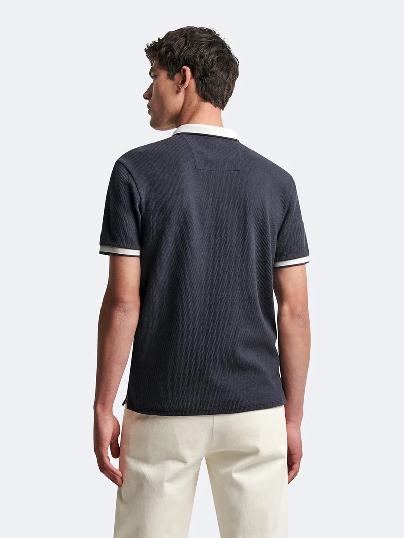 Polo manches courtes en coton bicolore
