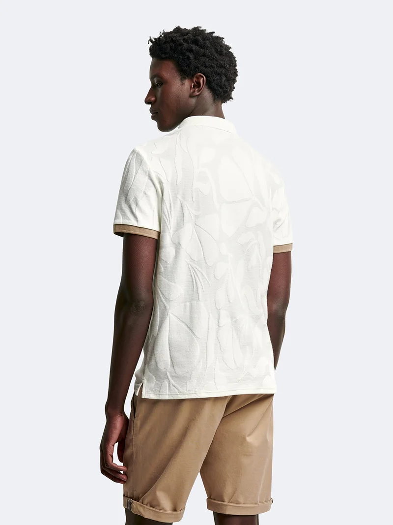 Polo manches courtes en coton à motifs