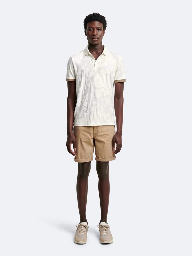 Polo manches courtes en coton à motifs