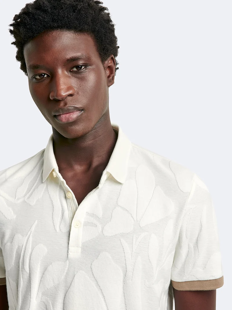 Polo manches courtes en coton à motifs