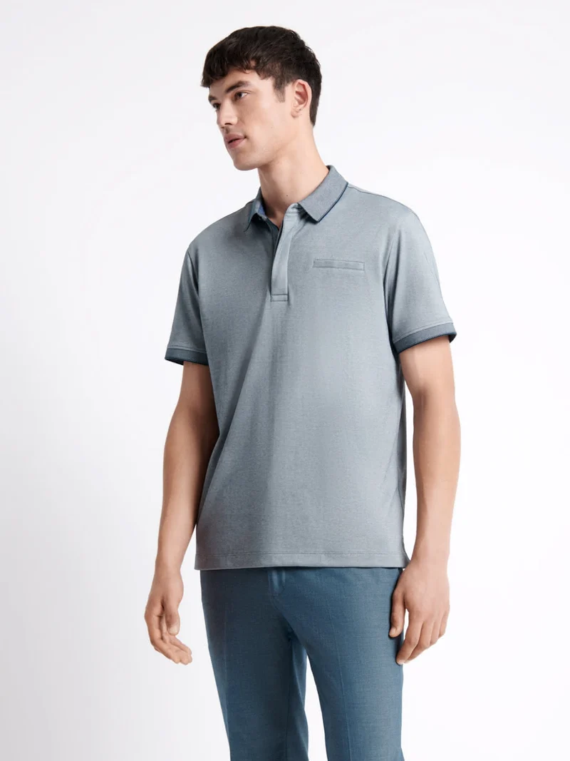 Polo manches courtes faux-uni en coton