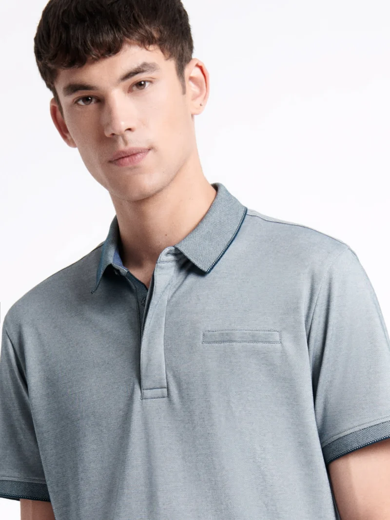 Polo manches courtes faux-uni en coton