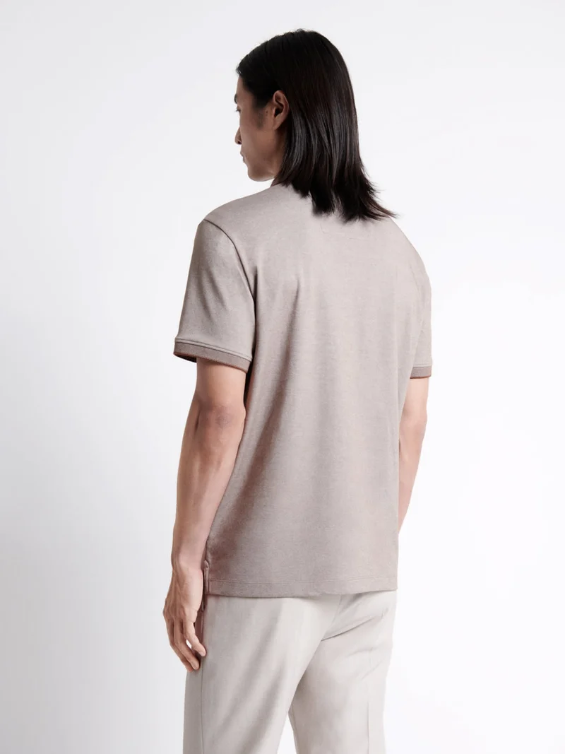 Polo manches courtes faux-uni en coton