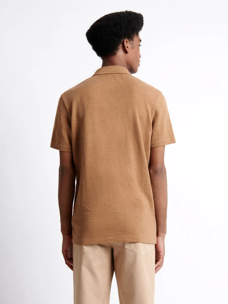 Polo manches courtes faux-uni en coton