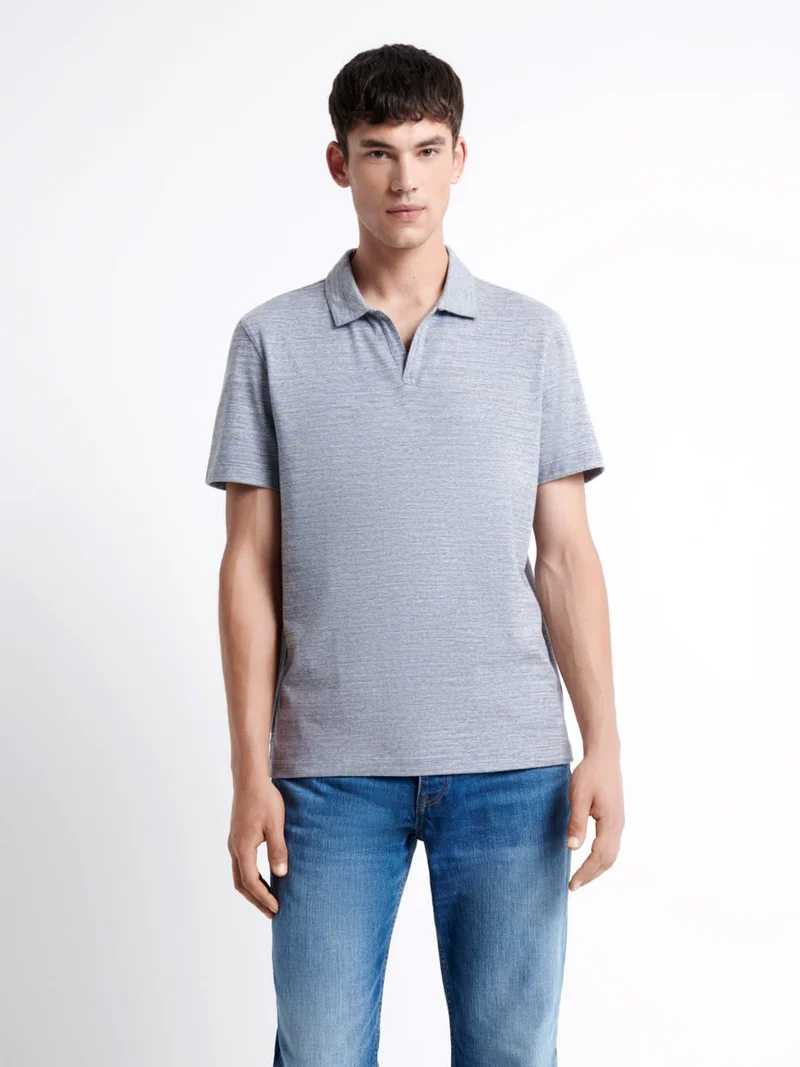 Polo manches courtes faux-uni en coton