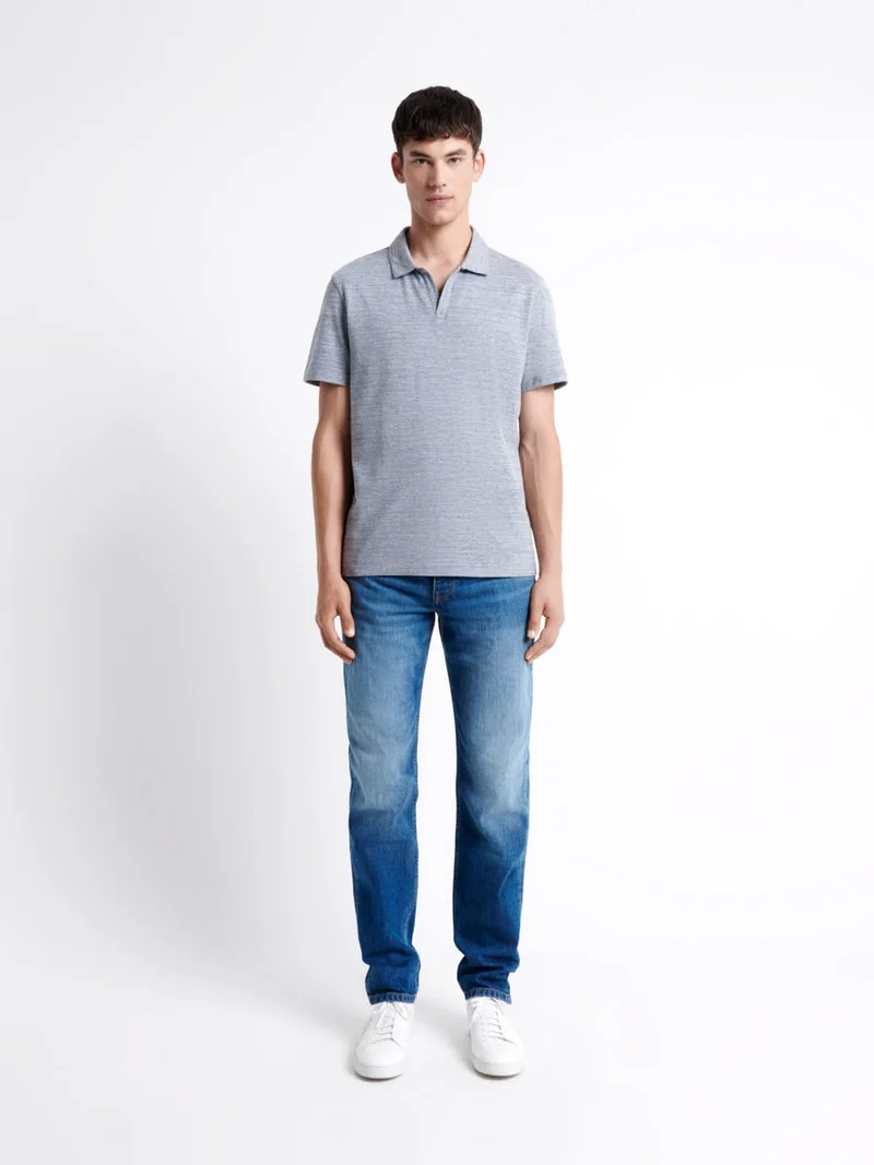 Polo manches courtes faux-uni en coton