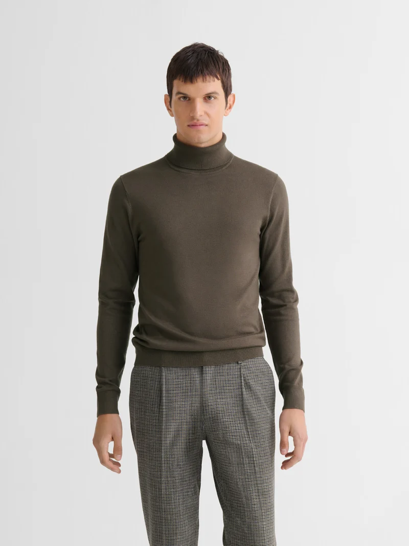 Pull col roulé en jersey