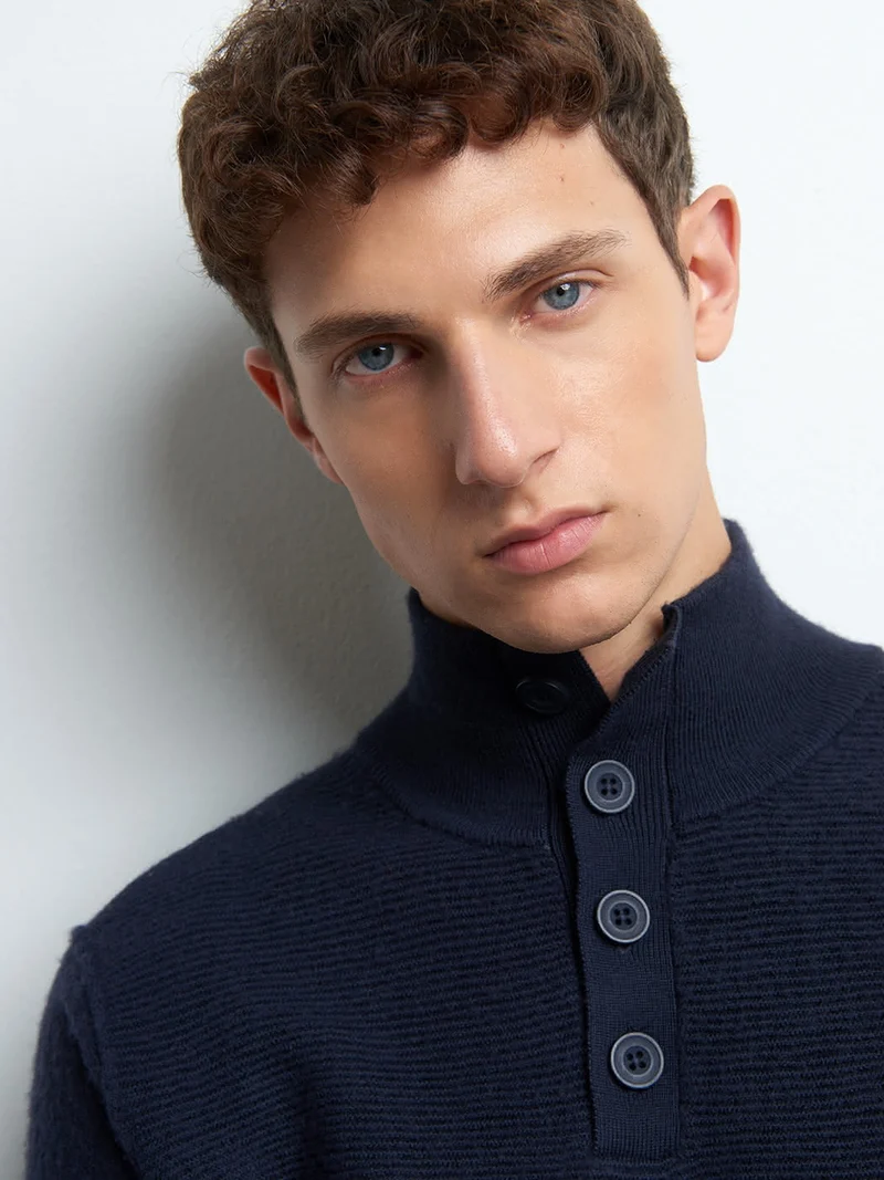 Pull col cheminée montant boutonné