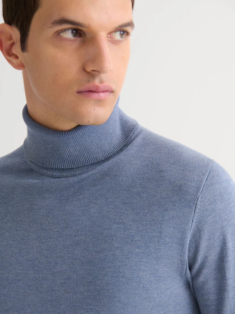 Pull col roulé en jersey