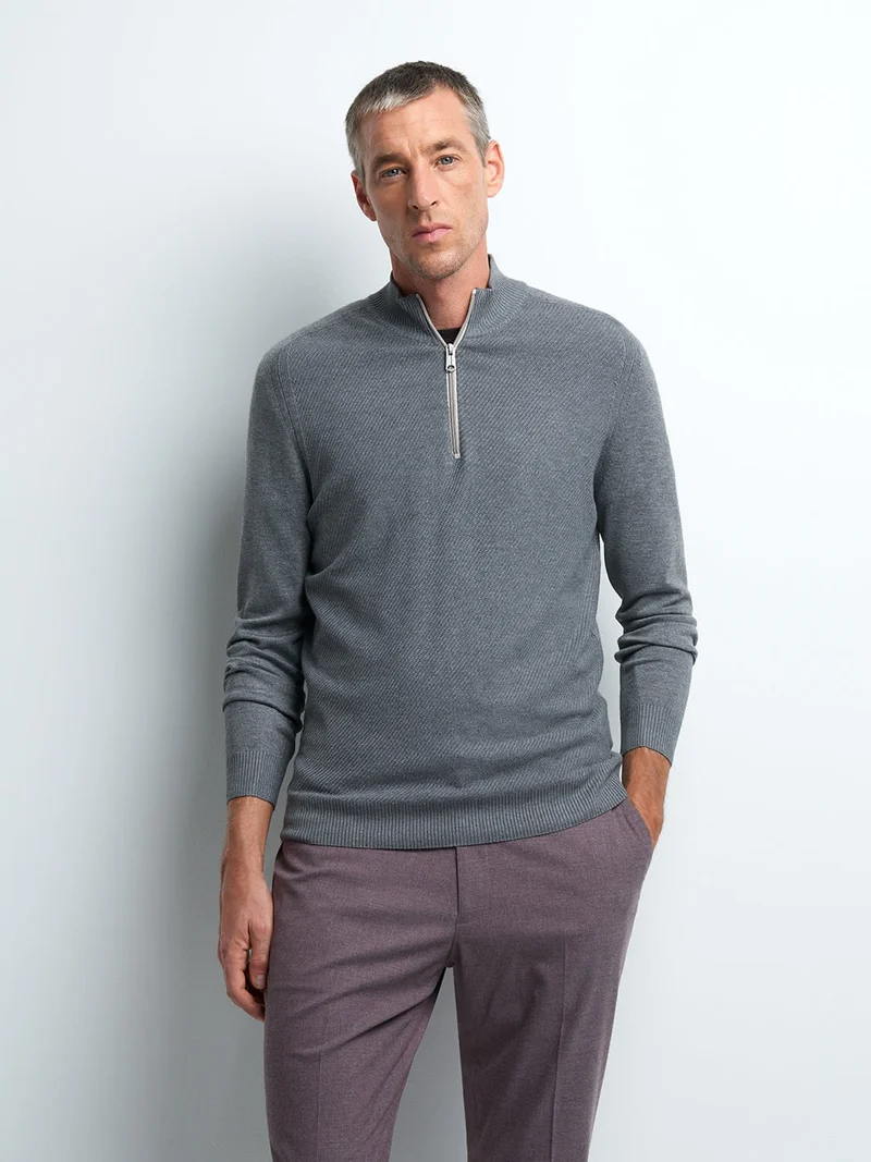 Pull col cheminée zippé