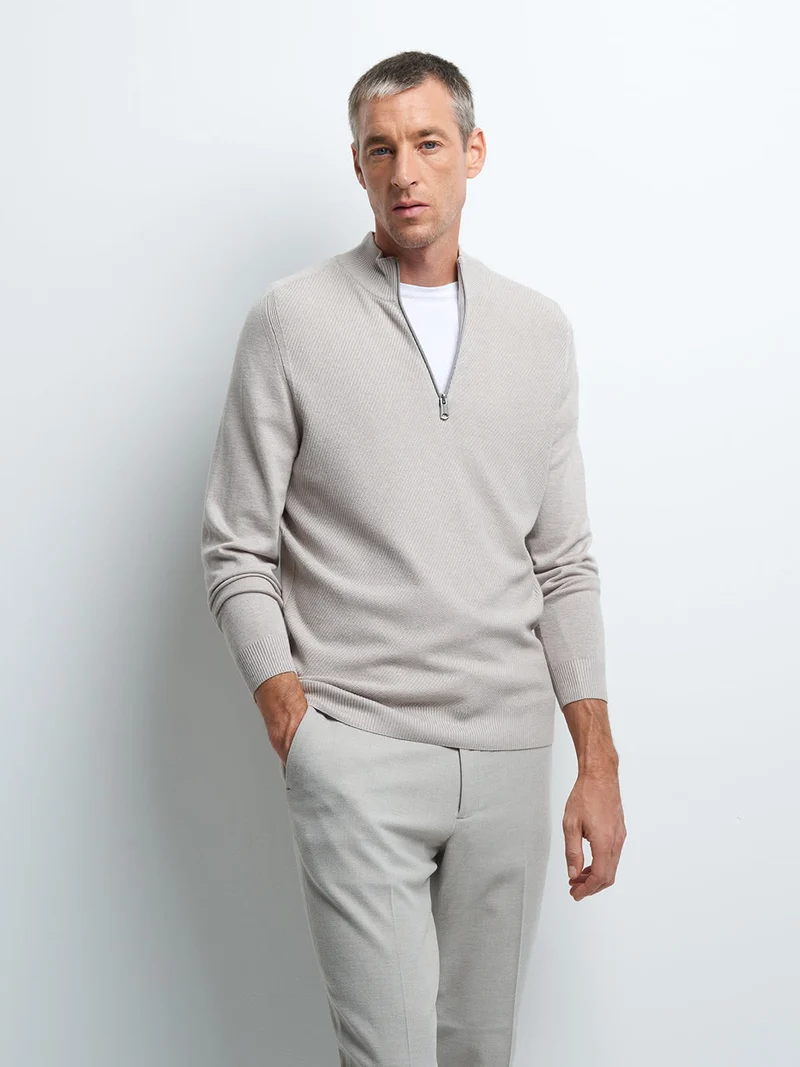 Pull col cheminée zippé