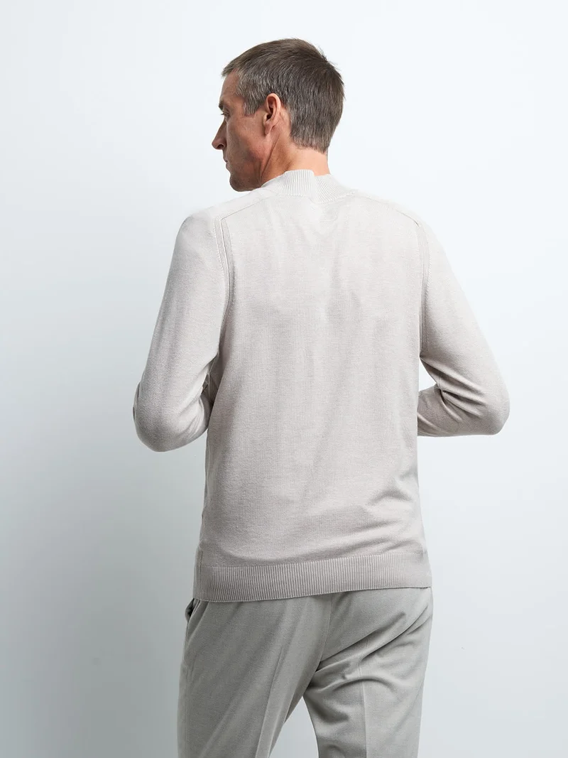 Pull col cheminée zippé