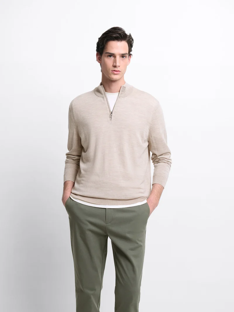 Pull col cheminée zippé en laine Mérinos