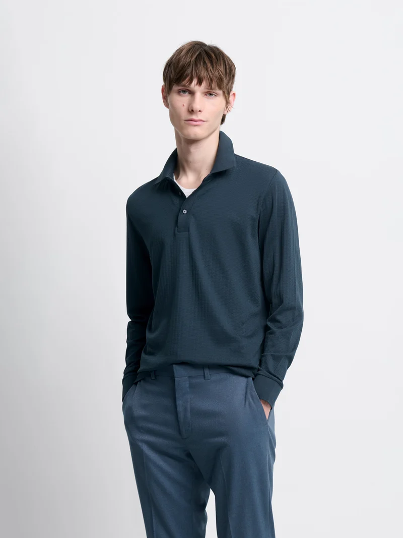 Polo manches longues col boutonné