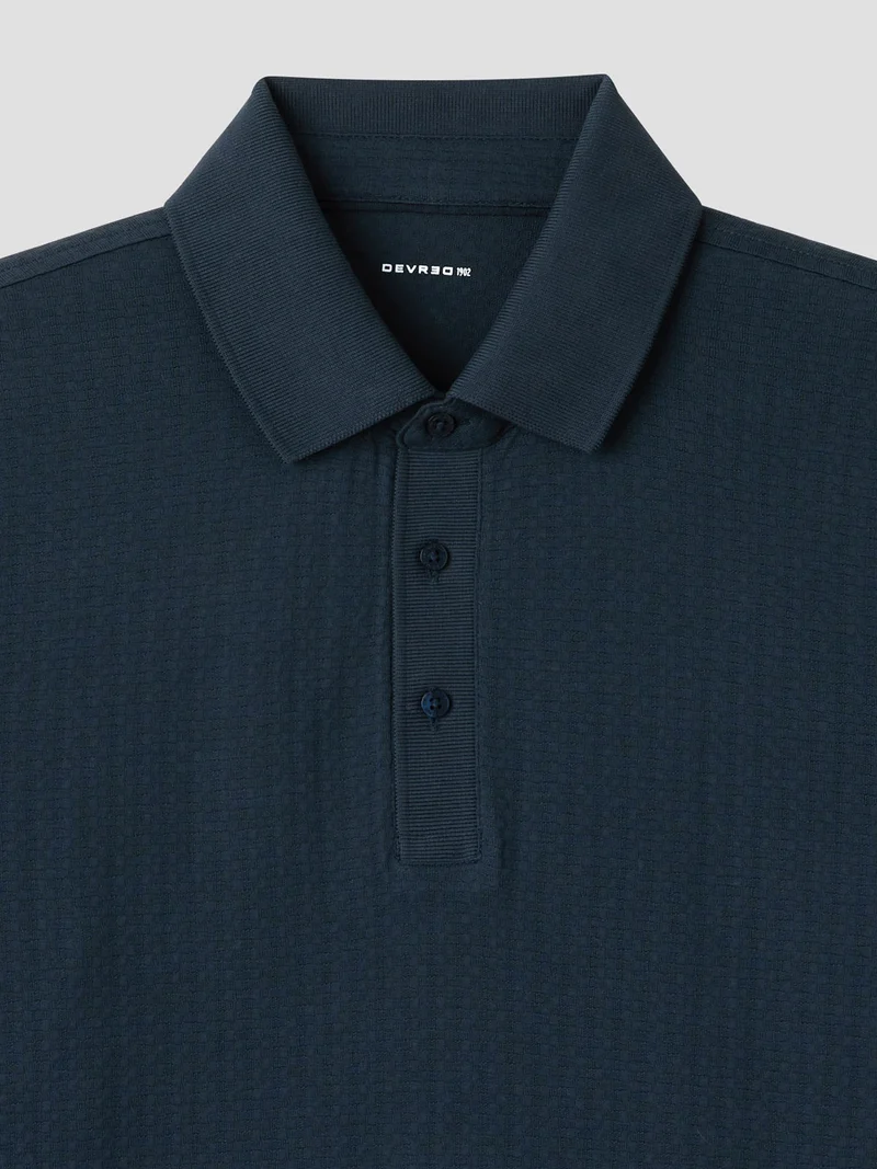 Polo manches longues col boutonné