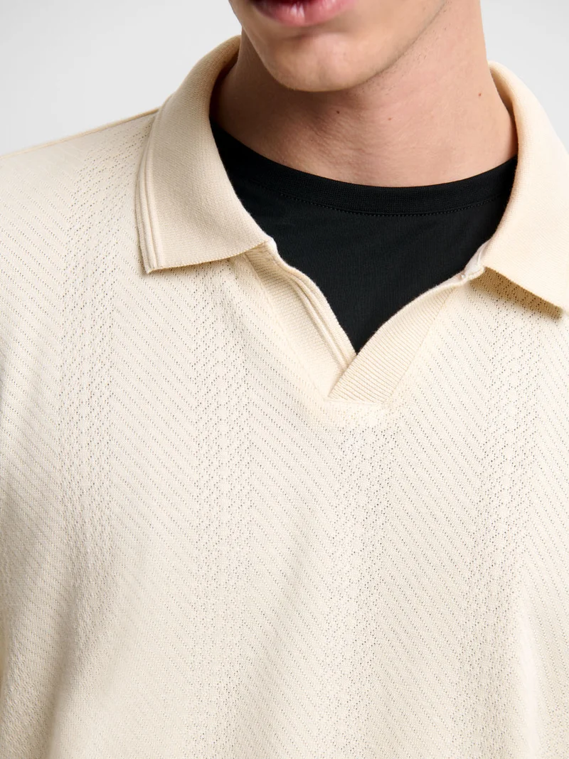 Polo manches longues col ouvert en coton