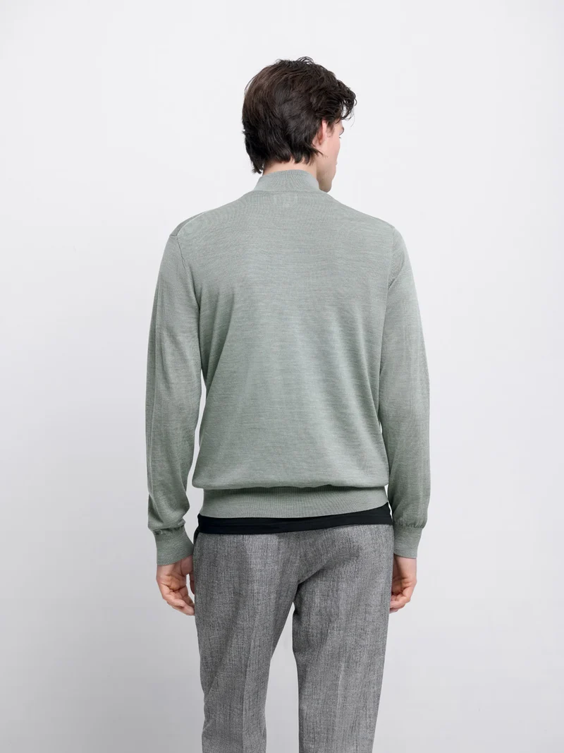 Pull col cheminée zippé en laine Mérinos