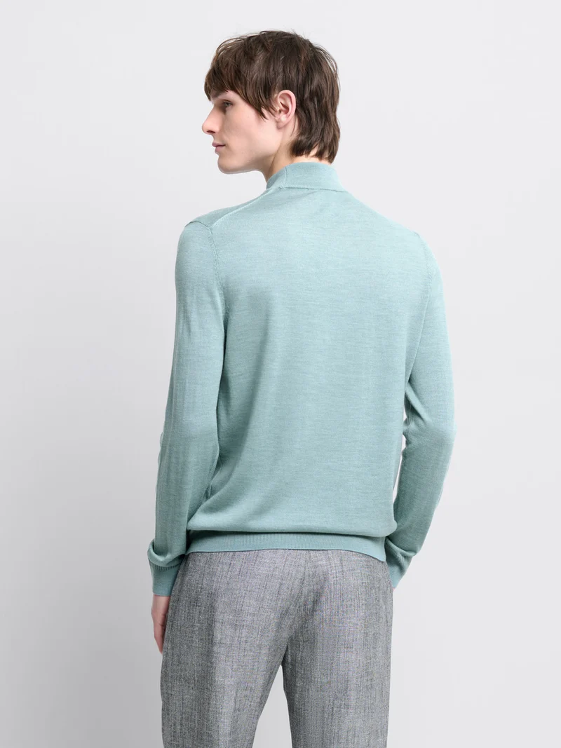 Pull col cheminée en laine Mérinos