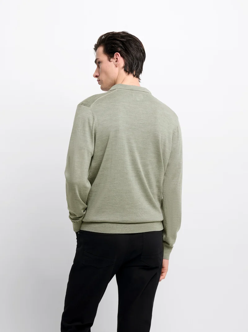 Pull col polo boutonné en laine Mérinos