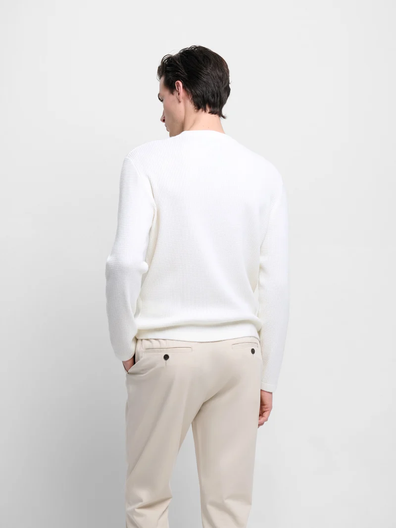 Pull col rond en maille torsadée